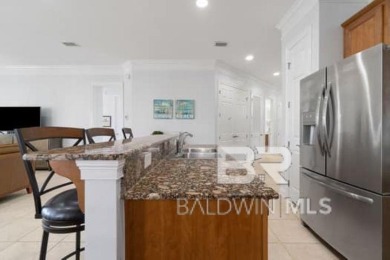 The Links Golf Villas, Unit E101.  Discover luxury coastal on Peninsula Golf and Racquet Club in Alabama - for sale on GolfHomes.com, golf home, golf lot