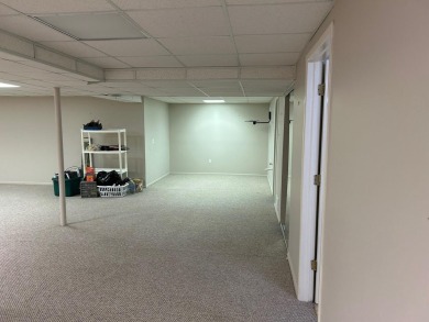 Carefree living in spacious condo with best location in the on The Maples Club in Michigan - for sale on GolfHomes.com, golf home, golf lot