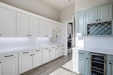 Located on a prime corner lot in the highly sought-after country on Pecan Plantation Country Club in Texas - for sale on GolfHomes.com, golf home, golf lot