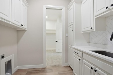 Located on a prime corner lot in the highly sought-after country on Pecan Plantation Country Club in Texas - for sale on GolfHomes.com, golf home, golf lot