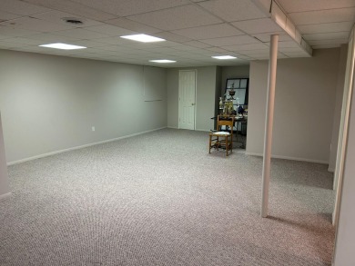 Carefree living in spacious condo with best location in the on The Maples Club in Michigan - for sale on GolfHomes.com, golf home, golf lot