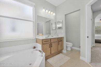 Welcome to 1143 Champions Drive, a beautifully maintained home on LPGA International Golf Course in Florida - for sale on GolfHomes.com, golf home, golf lot