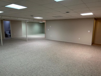 Carefree living in spacious condo with best location in the on The Maples Club in Michigan - for sale on GolfHomes.com, golf home, golf lot