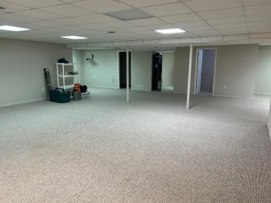 Carefree living in spacious condo with best location in the on The Maples Club in Michigan - for sale on GolfHomes.com, golf home, golf lot
