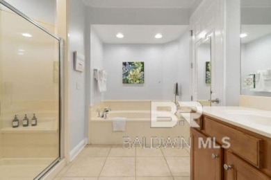 The Links Golf Villas, Unit E101.  Discover luxury coastal on Peninsula Golf and Racquet Club in Alabama - for sale on GolfHomes.com, golf home, golf lot