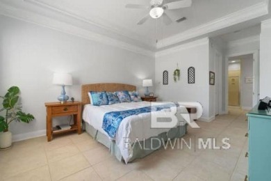The Links Golf Villas, Unit E101.  Discover luxury coastal on Peninsula Golf and Racquet Club in Alabama - for sale on GolfHomes.com, golf home, golf lot