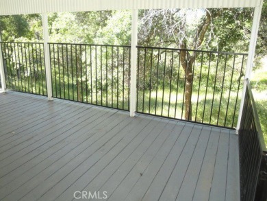 GREAT REMODELED WITH NEW PAINT, FLOORING, ROOF & APPLIANCES on Lake Oroville Golf and Event Center in California - for sale on GolfHomes.com, golf home, golf lot