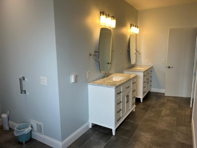 Carefree living in spacious condo with best location in the on The Maples Club in Michigan - for sale on GolfHomes.com, golf home, golf lot