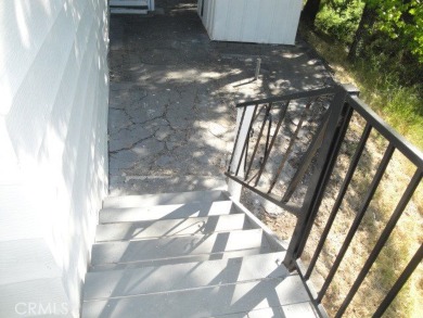 GREAT REMODELED WITH NEW PAINT, FLOORING, ROOF & APPLIANCES on Lake Oroville Golf and Event Center in California - for sale on GolfHomes.com, golf home, golf lot