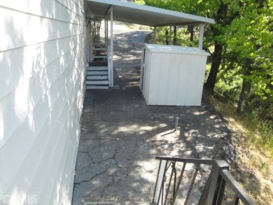 GREAT REMODELED WITH NEW PAINT, FLOORING, ROOF & APPLIANCES on Lake Oroville Golf and Event Center in California - for sale on GolfHomes.com, golf home, golf lot