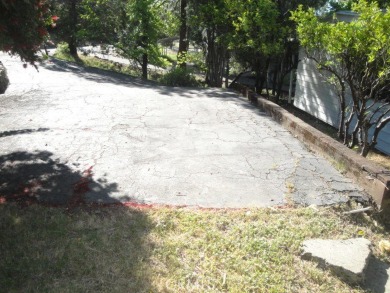 GREAT REMODELED WITH NEW PAINT, FLOORING, ROOF & APPLIANCES on Lake Oroville Golf and Event Center in California - for sale on GolfHomes.com, golf home, golf lot