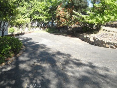 GREAT REMODELED WITH NEW PAINT, FLOORING, ROOF & APPLIANCES on Lake Oroville Golf and Event Center in California - for sale on GolfHomes.com, golf home, golf lot