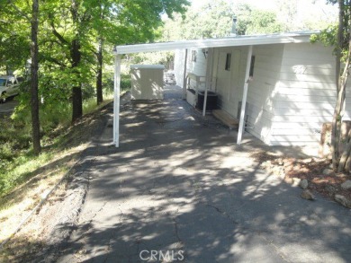 GREAT REMODELED WITH NEW PAINT, FLOORING, ROOF & APPLIANCES on Lake Oroville Golf and Event Center in California - for sale on GolfHomes.com, golf home, golf lot