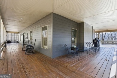 This Rustic Mountain Lodge is perfectly positioned on nearly a on Big Canoe Golf Club - Cherokee in Georgia - for sale on GolfHomes.com, golf home, golf lot