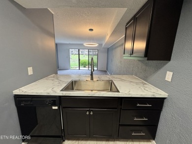 Recently updated 2-bedroom, 1.5-bath condo in Wilshire Heights on Stonehenge Golf Course in Tennessee - for sale on GolfHomes.com, golf home, golf lot