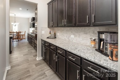 Welcome to Tillery Tradition! This beautiful 2019-built 2-story on The Tillery Tradition Country Club in North Carolina - for sale on GolfHomes.com, golf home, golf lot