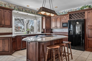 A home with lineage and presence, thoughtfully brought to life on Sycamore Hills Golf Club in Indiana - for sale on GolfHomes.com, golf home, golf lot