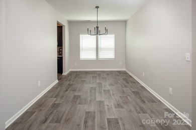 Welcome to Tillery Tradition! This beautiful 2019-built 2-story on The Tillery Tradition Country Club in North Carolina - for sale on GolfHomes.com, golf home, golf lot