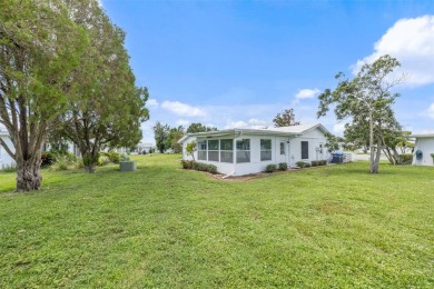 Welcome to this beautifully maintained 2-bedroom, 2-bathroom on River Isles Golf Club in Florida - for sale on GolfHomes.com, golf home, golf lot