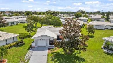 Welcome to this beautifully maintained 2-bedroom, 2-bathroom on River Isles Golf Club in Florida - for sale on GolfHomes.com, golf home, golf lot