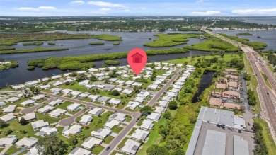Welcome to this beautifully maintained 2-bedroom, 2-bathroom on River Isles Golf Club in Florida - for sale on GolfHomes.com, golf home, golf lot