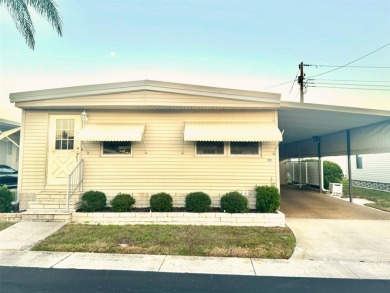 Spacious 1200 sq. ft. 2 large Bedrooms, 2 Baths, with relaxing on East Bay Golf Club in Florida - for sale on GolfHomes.com, golf home, golf lot