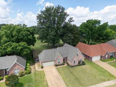 Move-in ready brick beauty in sought-after Olive Branch! Backing on Olive Branch Country Club in Mississippi - for sale on GolfHomes.com, golf home, golf lot