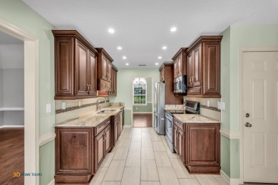 Move-in ready brick beauty in sought-after Olive Branch! Backing on Olive Branch Country Club in Mississippi - for sale on GolfHomes.com, golf home, golf lot