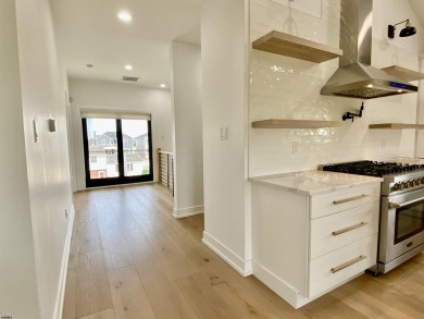 THIS IS LIVING! This stunning 4BD/4.5 BA home will *Wow* you at on The Links At Brigantine Beach in New Jersey - for sale on GolfHomes.com, golf home, golf lot