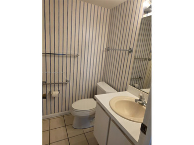 Welcome home to this spacious 2-bedroom, 2-bathroom condo on The Golf Club of Jupiter in Florida - for sale on GolfHomes.com, golf home, golf lot