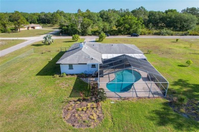 Amazing Pool home on 1 acre with complete outside kitchen by on Indian Lake Estates Golf and Country Club in Florida - for sale on GolfHomes.com, golf home, golf lot