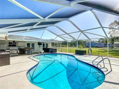 Amazing Pool home on 1 acre with complete outside kitchen by on Indian Lake Estates Golf and Country Club in Florida - for sale on GolfHomes.com, golf home, golf lot