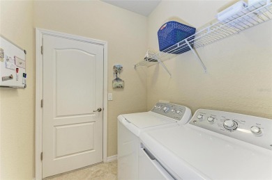 THE PERFECT HOME in the exceptional gated community of River on River Strand Golf and Country Club At Heritage Harbour  in Florida - for sale on GolfHomes.com, golf home, golf lot