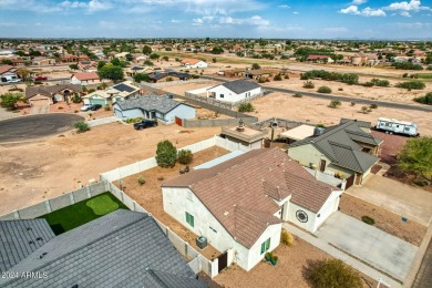 This stunning home is a meticulously maintained 4 bedroom, 2 on Arizona City Golf Club in Arizona - for sale on GolfHomes.com, golf home, golf lot