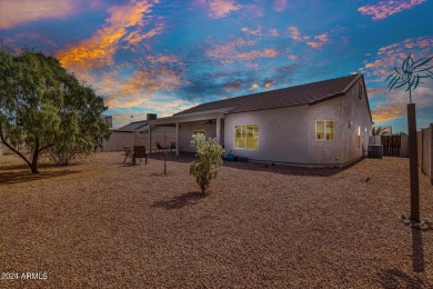 This stunning home is a meticulously maintained 4 bedroom, 2 on Arizona City Golf Club in Arizona - for sale on GolfHomes.com, golf home, golf lot