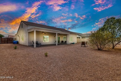 This stunning home is a meticulously maintained 4 bedroom, 2 on Arizona City Golf Club in Arizona - for sale on GolfHomes.com, golf home, golf lot