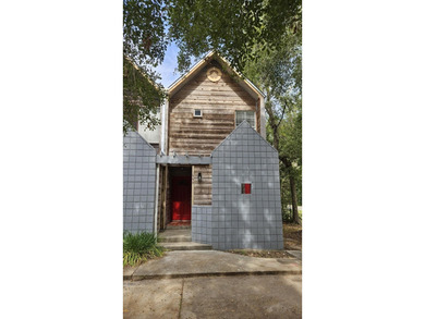 Renovated contemporary townhome with fun diagonal design on Hilaman Park Golf Course in Florida - for sale on GolfHomes.com, golf home, golf lot