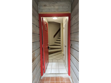 Renovated contemporary townhome with fun diagonal design on Hilaman Park Golf Course in Florida - for sale on GolfHomes.com, golf home, golf lot