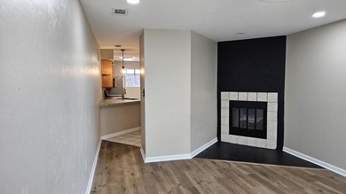 Renovated contemporary townhome with fun diagonal design on Hilaman Park Golf Course in Florida - for sale on GolfHomes.com, golf home, golf lot