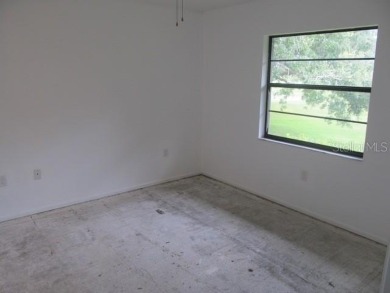Located in the middle of just about anything you could need on Capri Isle Golf Club in Florida - for sale on GolfHomes.com, golf home, golf lot