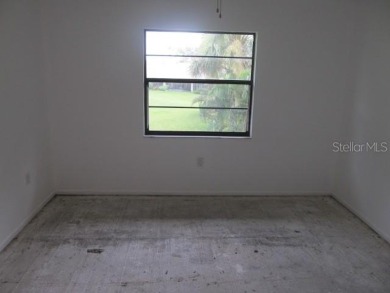 Located in the middle of just about anything you could need on Capri Isle Golf Club in Florida - for sale on GolfHomes.com, golf home, golf lot
