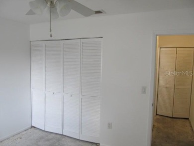 Located in the middle of just about anything you could need on Capri Isle Golf Club in Florida - for sale on GolfHomes.com, golf home, golf lot