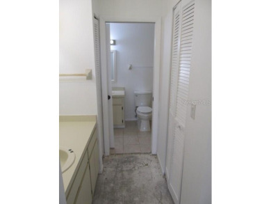 Located in the middle of just about anything you could need on Capri Isle Golf Club in Florida - for sale on GolfHomes.com, golf home, golf lot