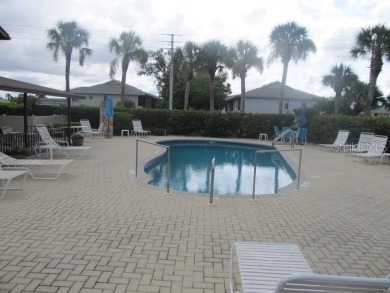 Located in the middle of just about anything you could need on Capri Isle Golf Club in Florida - for sale on GolfHomes.com, golf home, golf lot