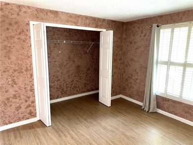 Discover this charming 3-bedroom, 2-bathroom (2 car garage) home on Lakewood Country Club in Florida - for sale on GolfHomes.com, golf home, golf lot