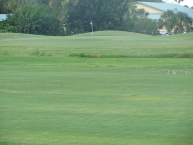 Located in the middle of just about anything you could need on Capri Isle Golf Club in Florida - for sale on GolfHomes.com, golf home, golf lot