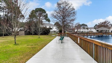 Stunning Townhome in Tiger Lake with Serene Lake Views! Discover on Tiger Point Golf and Country Club in Florida - for sale on GolfHomes.com, golf home, golf lot