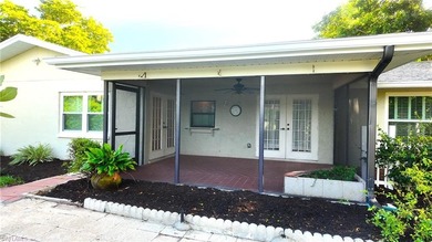 Discover this charming 3-bedroom, 2-bathroom (2 car garage) home on Lakewood Country Club in Florida - for sale on GolfHomes.com, golf home, golf lot