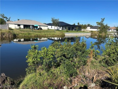 This prime 100-foot freshwater canal lot offers the perfect on Royal Tee Country Club in Florida - for sale on GolfHomes.com, golf home, golf lot