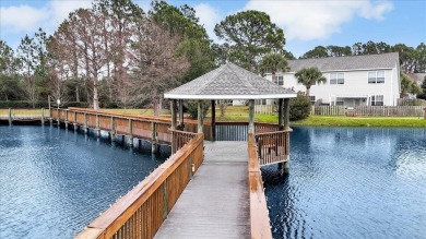 Stunning Townhome in Tiger Lake with Serene Lake Views! Discover on Tiger Point Golf and Country Club in Florida - for sale on GolfHomes.com, golf home, golf lot